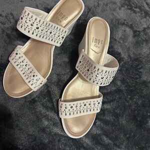 White wedges with silver and gold accents